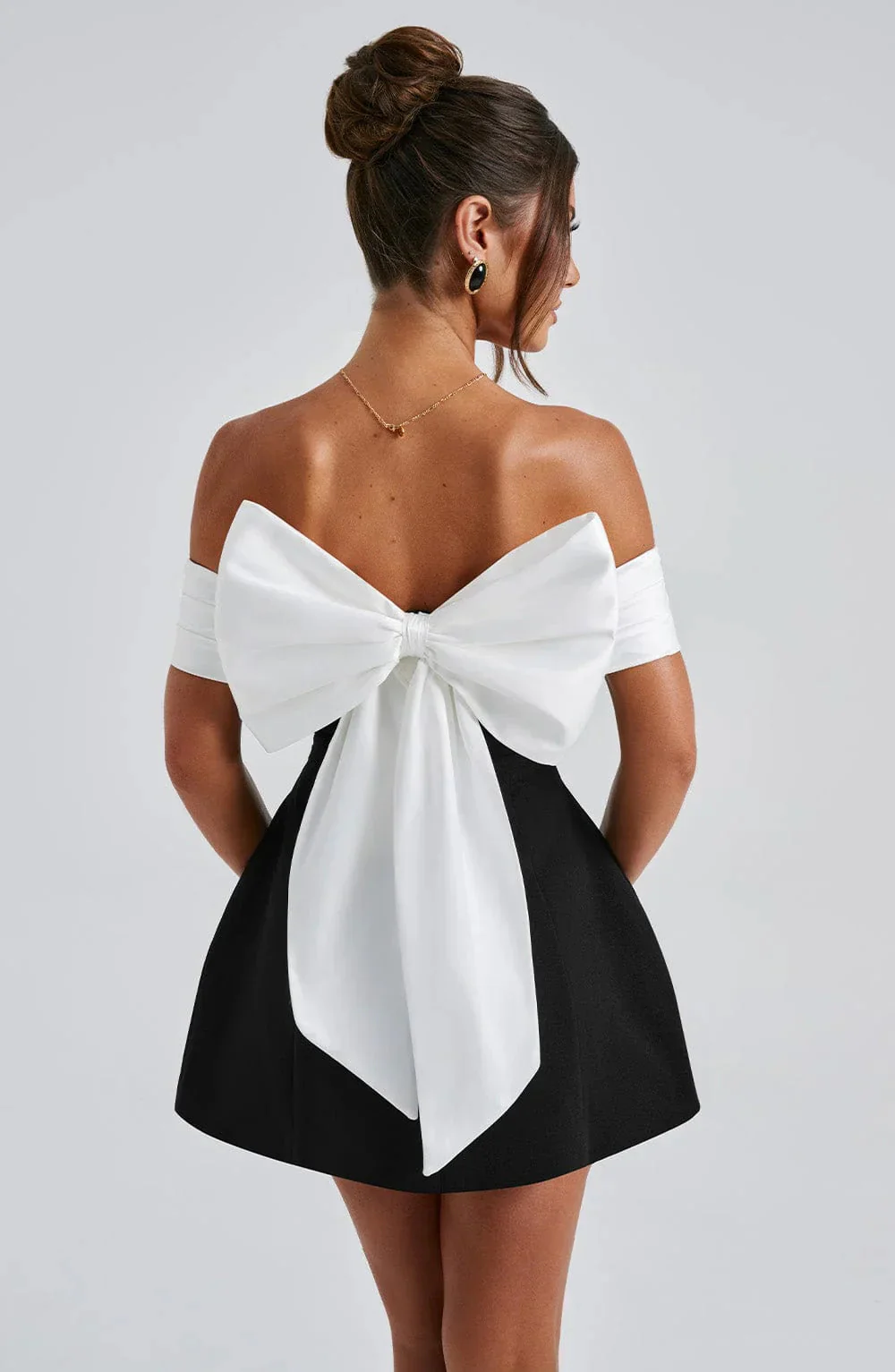 Sophisticated Mini Dress With A Bow Design - Image 2