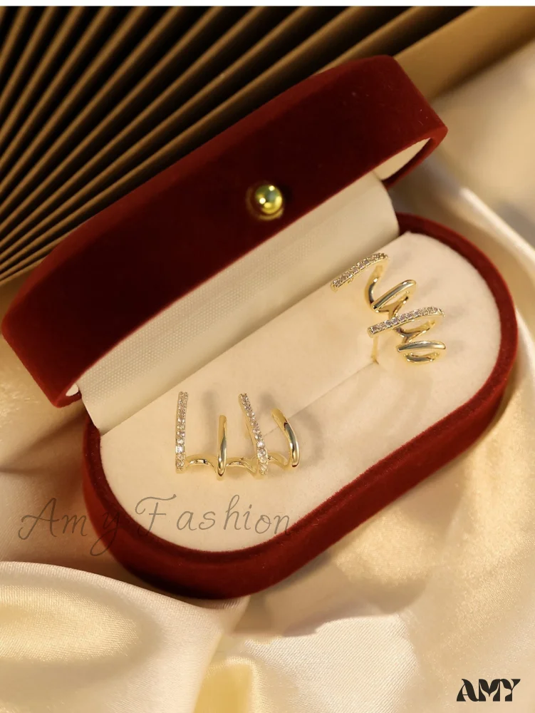 Amy Fashion - Women's Geometric One-piece Four-claw Design Earrings - Image 3