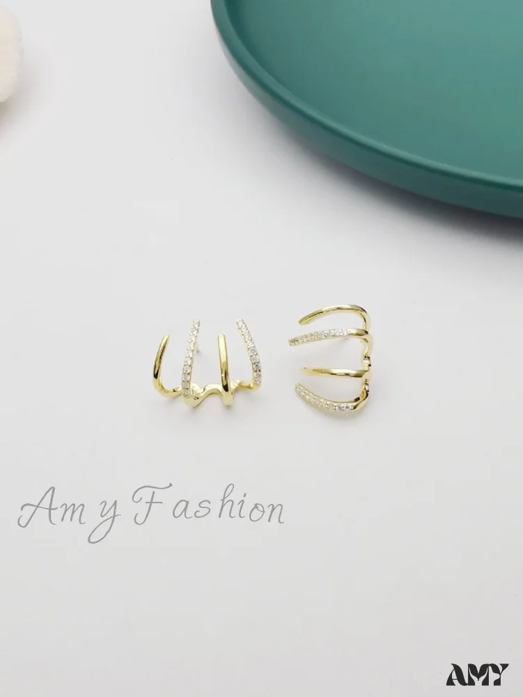 Amy Fashion - Women's Geometric One-piece Four-claw Design Earrings - Image 5